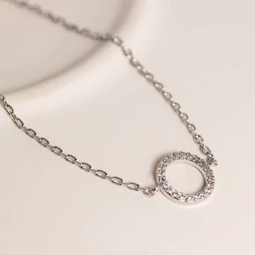 Cubic Zirconia Circle Charm Bracelet in White Gold Close Up