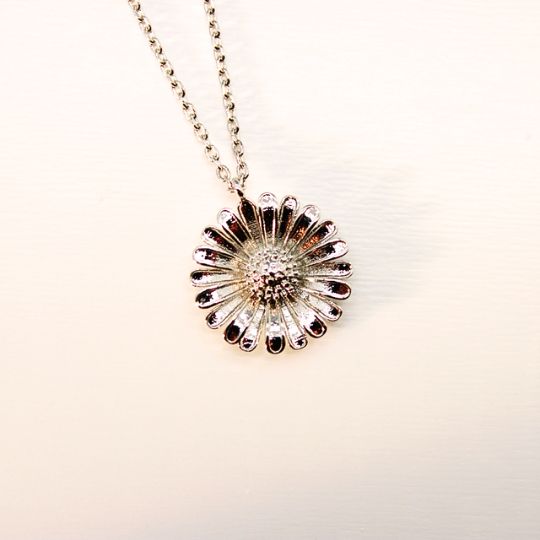 Tiny Daisy Charm Necklace in White Gold Color Front Close Up